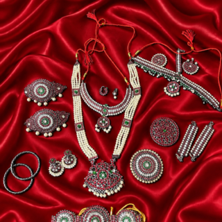 Oxidized black-metal South Indian classical dance and bridal jewelry set featuring kemp stones and pearl accents