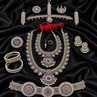An ornate silver-polish temple and bridal or Barathanatya full jewellery set